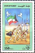 Soldiers carrying Kuwaiti flag