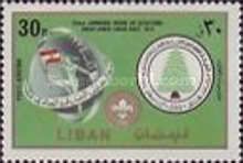 Globe with flag & Scout emblem