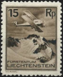Airplane over Snow-capped Mountain Peaks