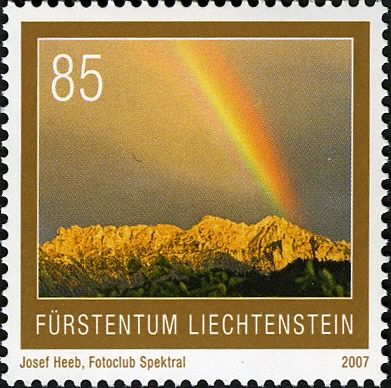 Rainbow above Three sisters Massif