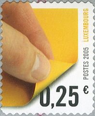 Fingers Peeling Back Label (yellow)