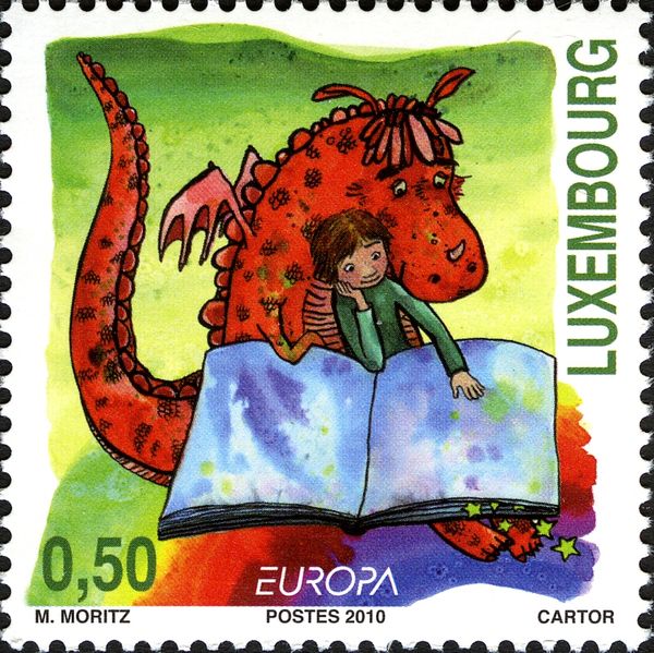 Boy and Dragon reading