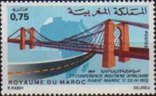 Suspension Bridge and Motorway in front of a Map of Africa