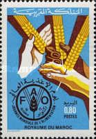 Hands Holding Ears of Wheat and Emblem
