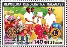 Village health clinic, Rotary, Lions emblems