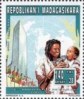 UN50 Woman feeding child