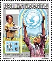 Child Holding Plate of Food and Child Holding UNICEF Emblem