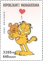 Garfield holding teddy bear