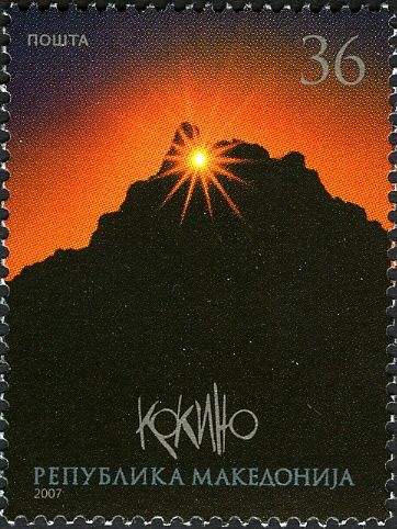 Sunrise over the marker indicating the Summer Soltice