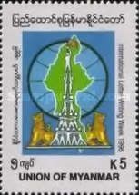 Stylized figures forming pyramid, flag, map