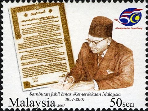 Tunku Abdul Rahman signing declaration of independence