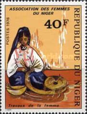 Woman weaving straw