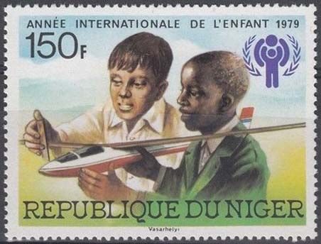 Children with model airplane