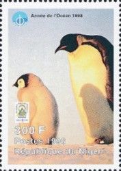 Emperor Penguin with Bigger Chick