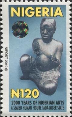 Seated Human Figurine