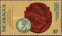 Colonial coin and embossed revenue stamp