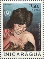 Mother breastfeeds a child