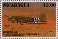C-47 transports dropping paratroopers.