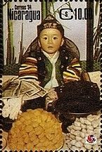 Boy on first birthday, gifts of fruit S/S