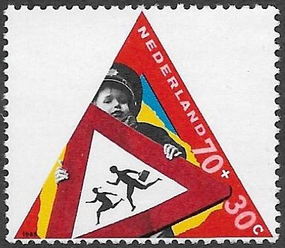 Boy Holding Children Crossing Sign