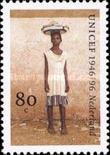 Girl Carrying Platter on Head