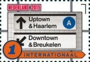 NYC subway signs with Dutch spellings of Harlem and Brooklyn