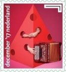 Abstract pyramidal Christmas tree with hands and accordion
