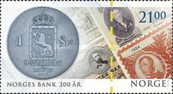 Speciedaler coin and old banknotes