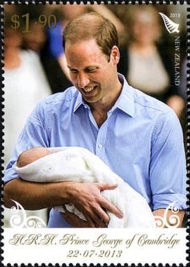 Prince William holding Prince George