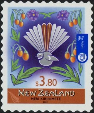Kiwi Bird (Rhipidura fuliginosa) and Flowers