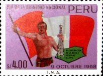 Man holding Flag and Oil Rig
