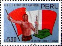 Man holding Flag and Oil Rig