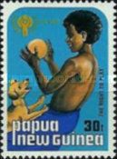 Boy playing with dog and ball