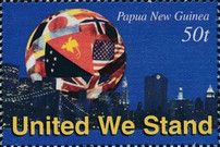 Globe covered in National Flags and New York skyline