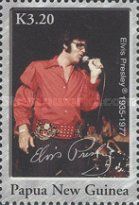 Elvis in red singing