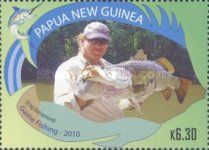Angler with 10kg barramundi