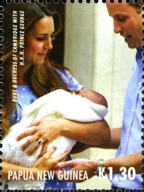 Catherine handing Prince George to William