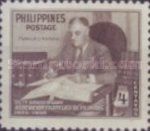 Franklin D. Roosevelt (1882-1945) with Stamp Collection