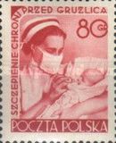 Nurse administering the vaccine to a baby