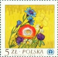 Wild Flowers against the Background of Grain