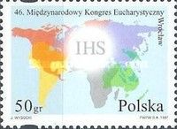 Host with the letters IHS, stylized map of the World