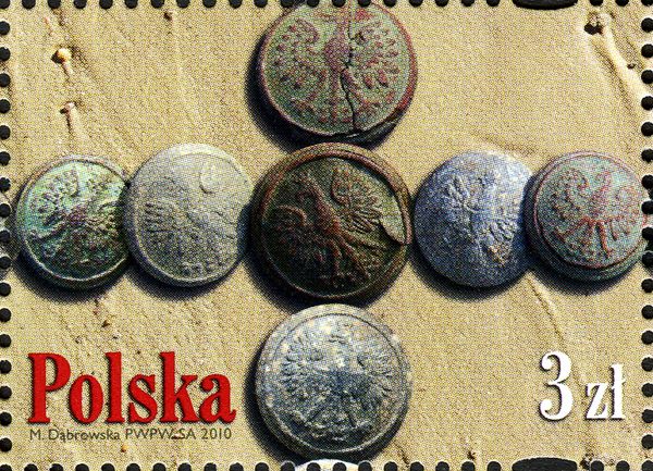 Uniform Buttons on Sand