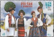 Para rumuńska w stroju Bistrita-Năsăud oraz para polska w st