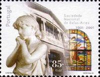 Statue, house facade, stained-glass window