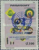 Hands holding symbols overprinted U.N.O. emblem