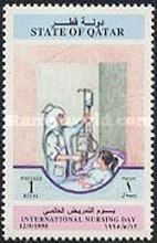 Nurse adjusting IV for patient.