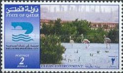 Ras Laffan Industrial City emblem, flamingos near industrial