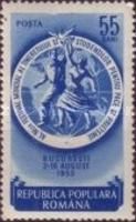 Girl and boy with peace dove in front of globe