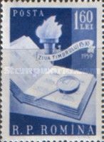 Stamp Day: Stamp album, magnifier, torch with inscription