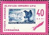 Stamp with Sputnik 2 and Laika, rocket